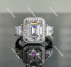 The Aunt Gabby three stone halo emerald moissanite engagement ring
