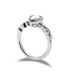 doveggs pear side stone moissanite engagement ring