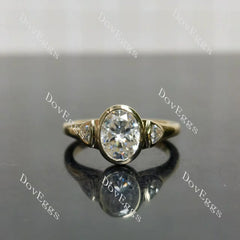 Oval bezel three stones moissanite engagement ring| DovEggs