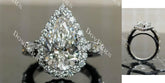 Dean's pear halo pave 3/4 eternity moissanite engagement ring | Doveggs