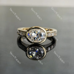 Oval bezel channel set moissanite engagement ring| DovEggs