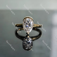 Kindal Dovie Doutch Marquise cut solitaire moissanite engagement ring