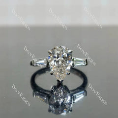 The Maddox-Pear three stones moissanite engagement ring| DovEggs