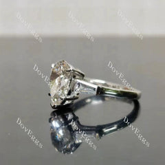The Maddox-Pear three stones moissanite engagement ring| DovEggs