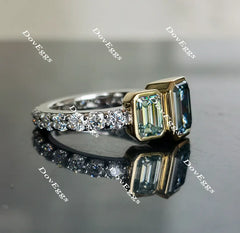 DovEggs emerald bezel setting three-stone moissanite ring