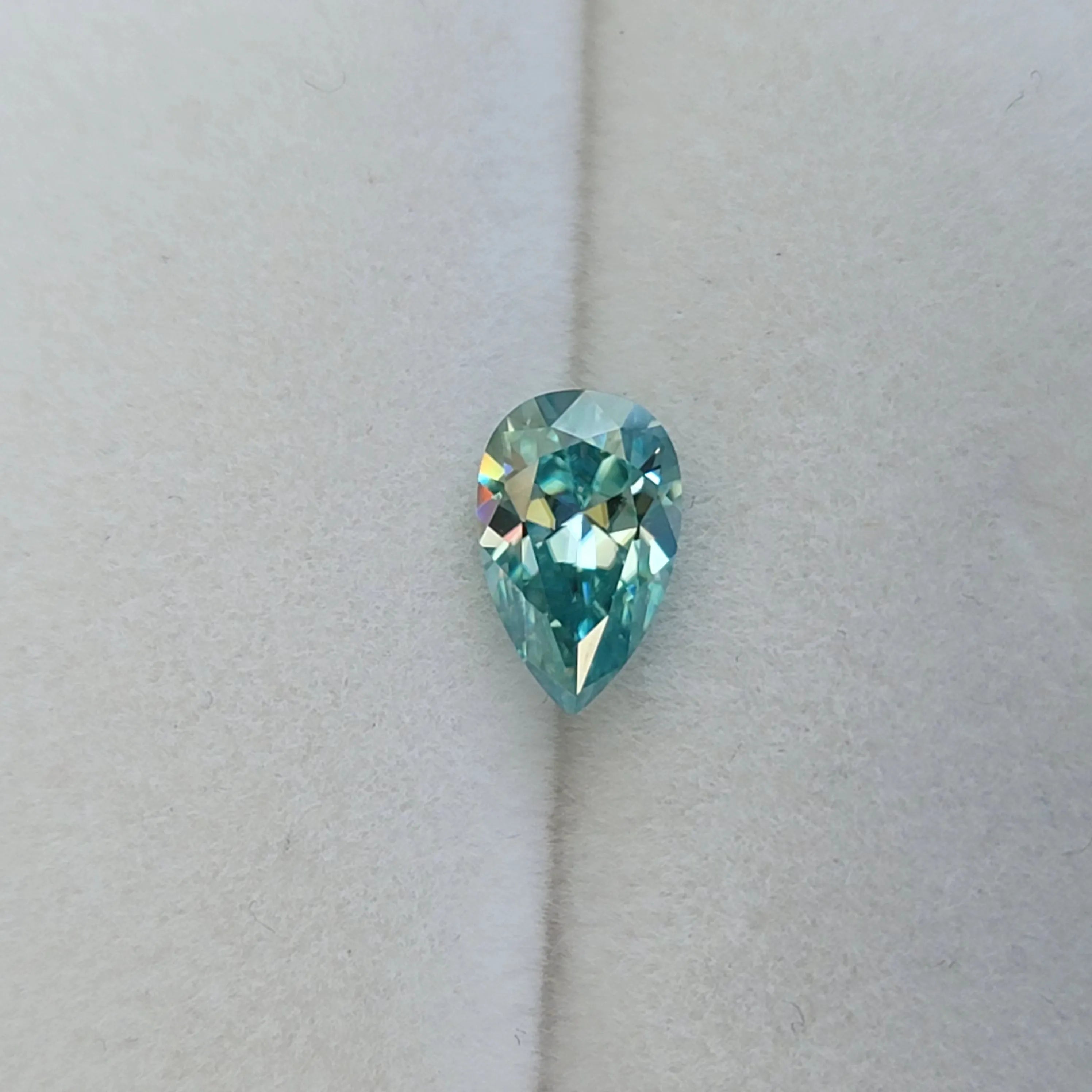 Doveggs pear 1.25ct accident color blue moissanite loose stone