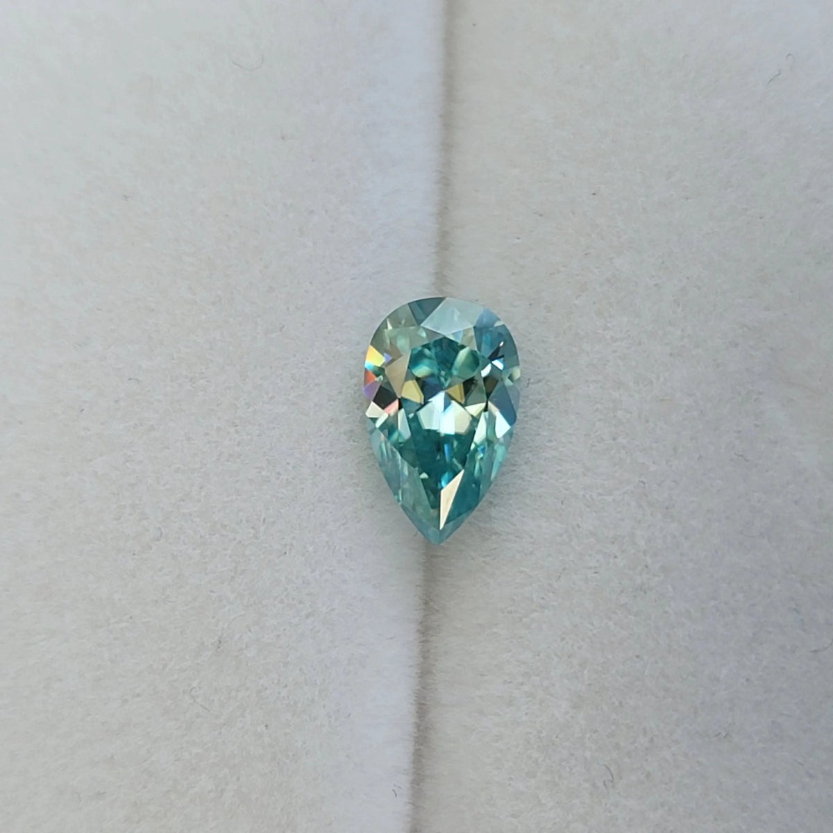 Doveggs pear 1.25ct accident color blue moissanite loose stone
