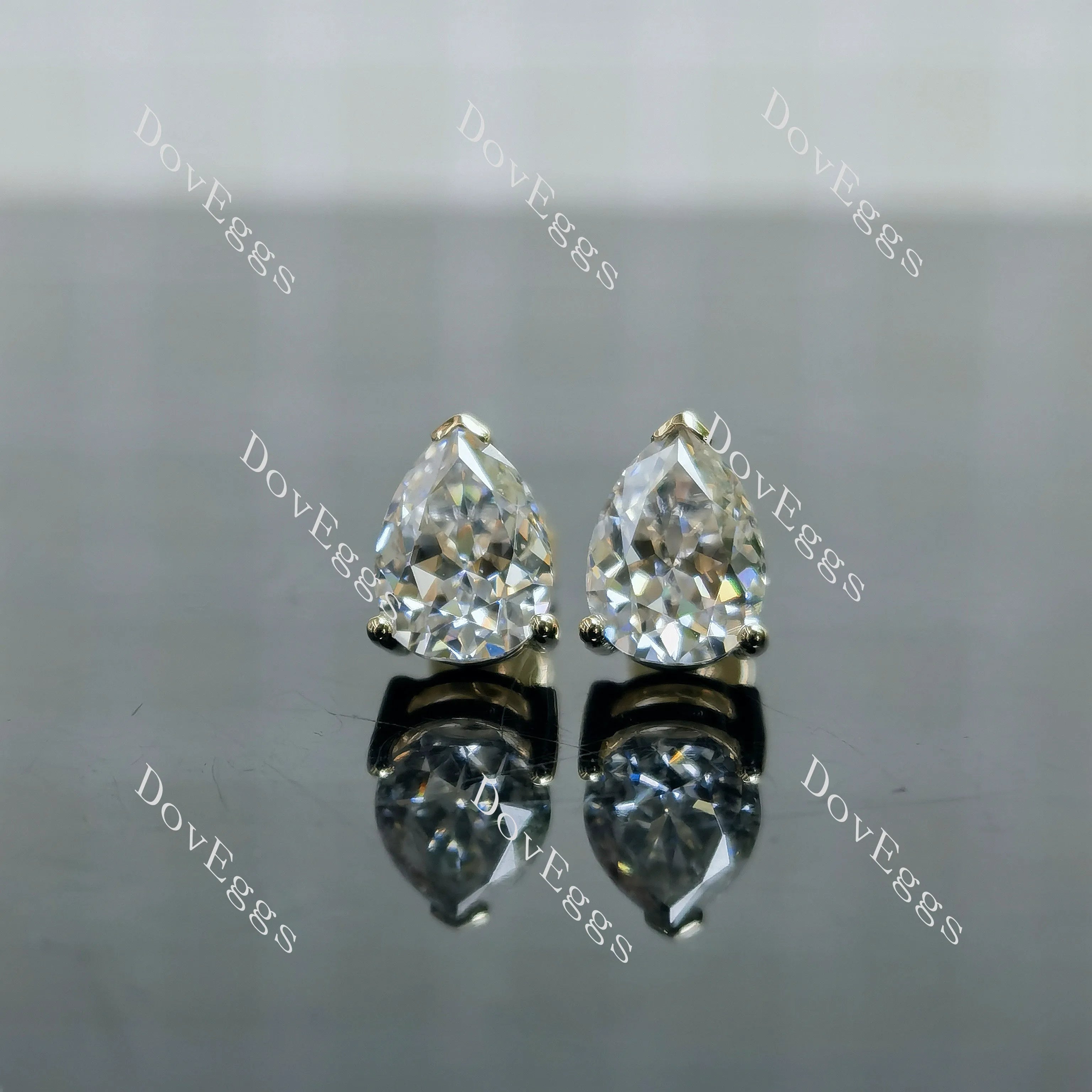 Doveggs pear pave moissanite earrings
