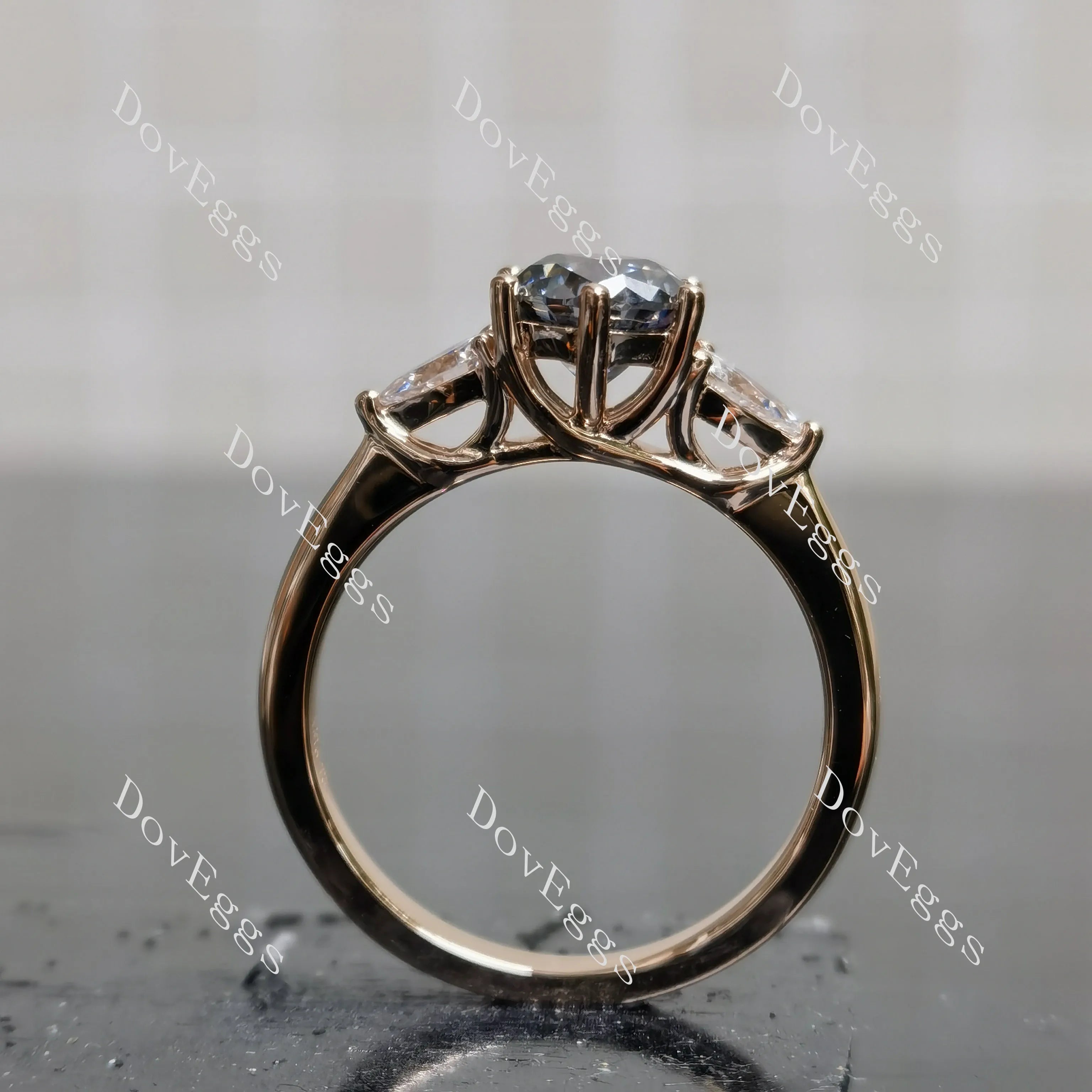 Doveggs round three-stone stardust grey moissanite engagement ring