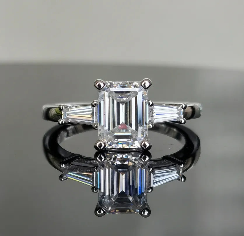 DovEggs 2 carat emerald three stone sterling silver moissanite ring