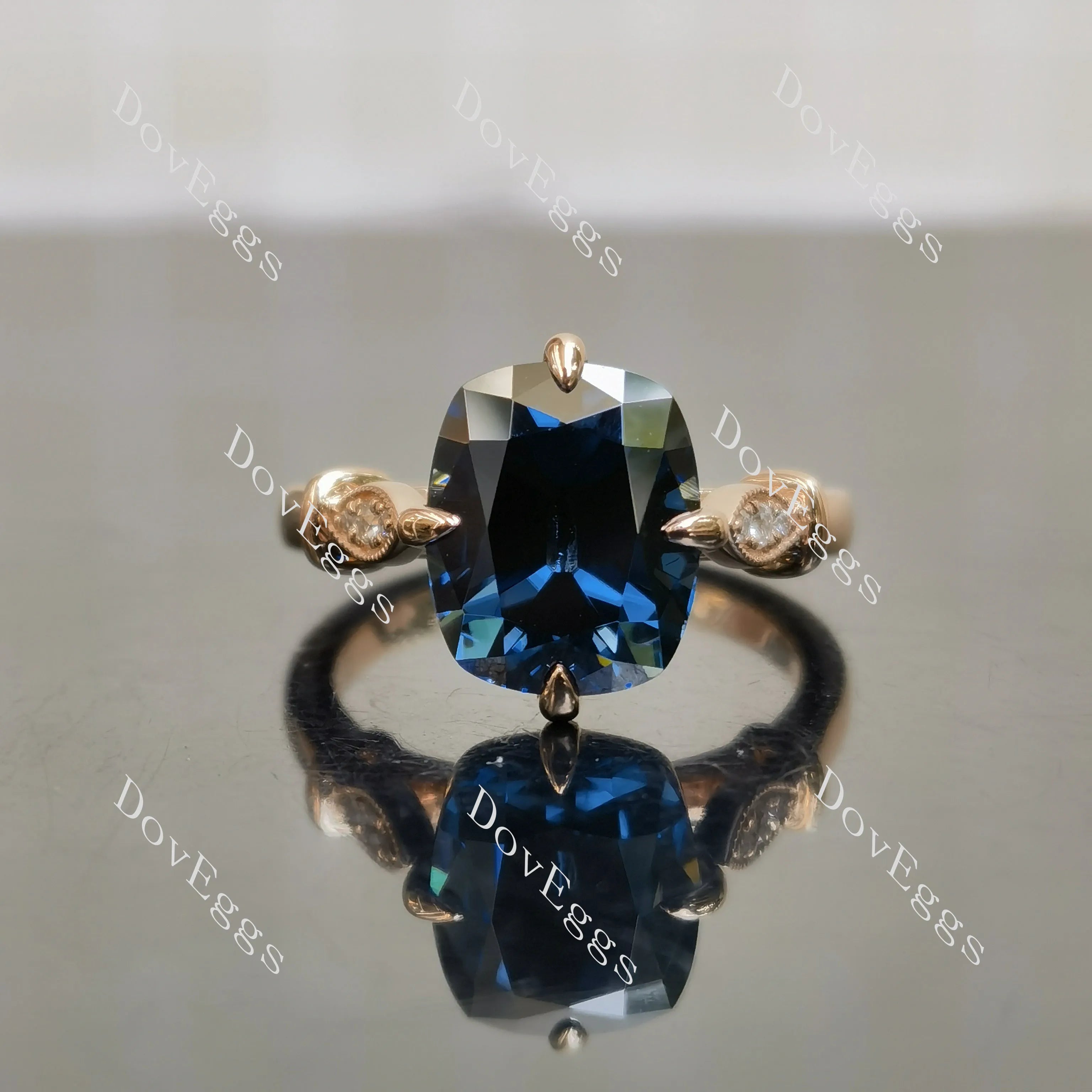 Twilight Dreams cushion side stones twilight blue moissanite engagement ring