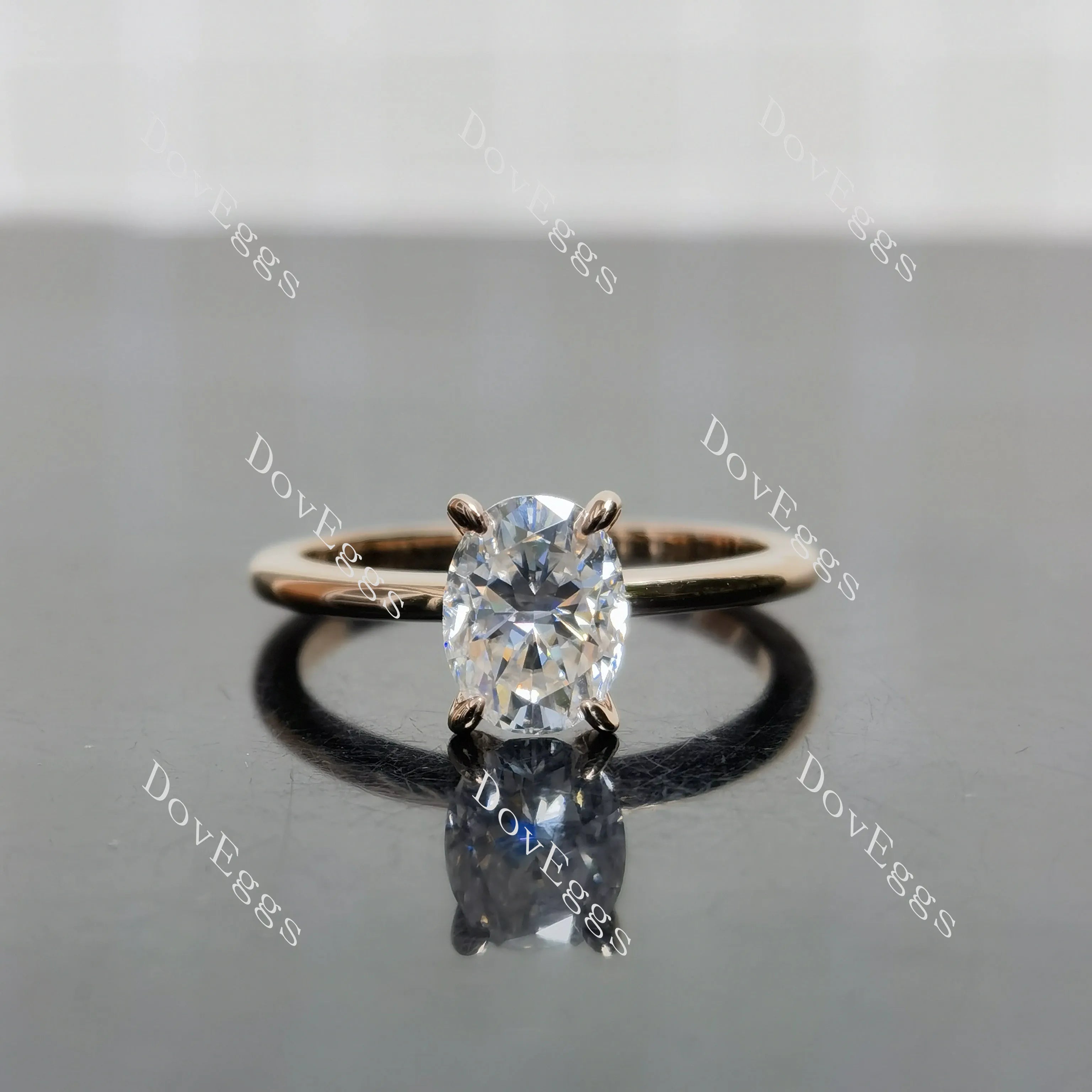 (size 7) Doveggs sterling silver plated with rose gold 1.5ct oval crushed ice cut moissanite engagement ring
