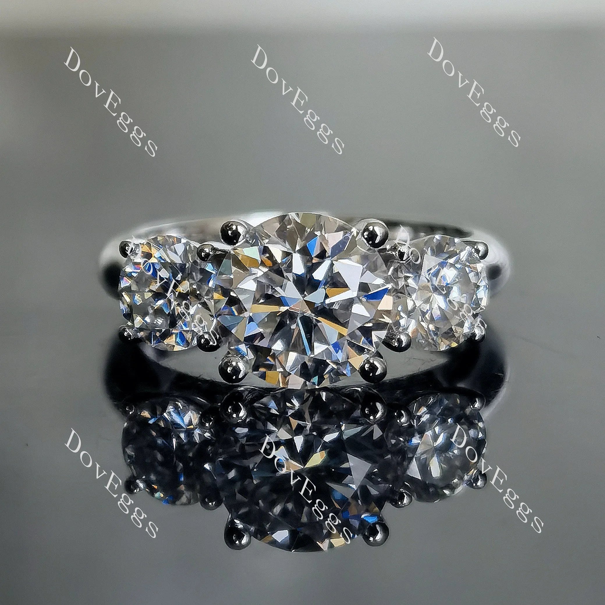 Doveggs round three-stone moissanite engagement ring