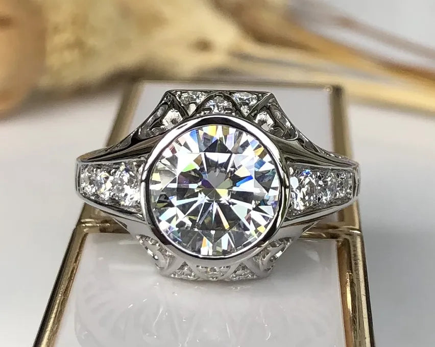 Doveggs round hollow out moissanite engagement ring