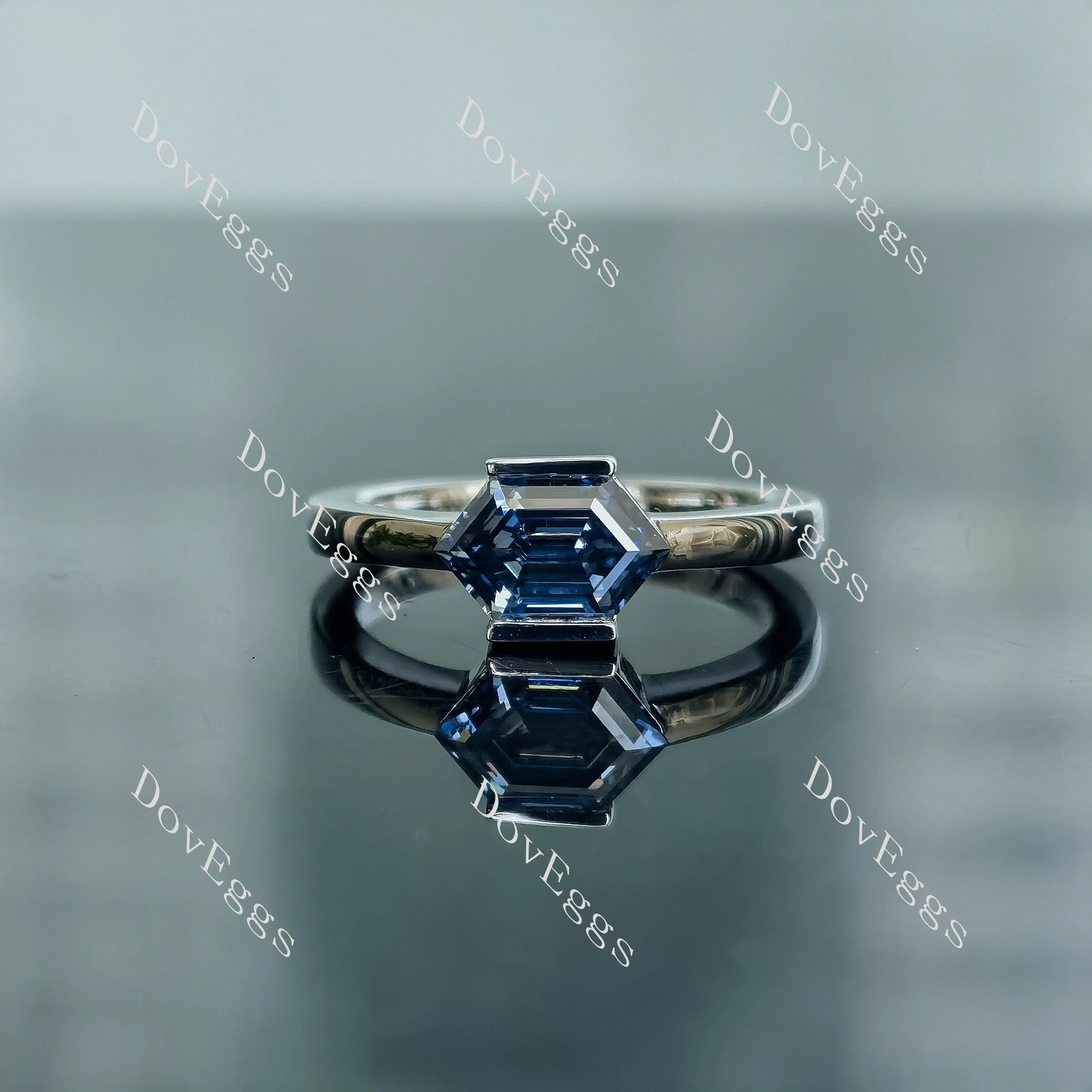 Doveggs Dovie Doutch Marquise cut bezel solitaire twilight blue moissanite engagement ring