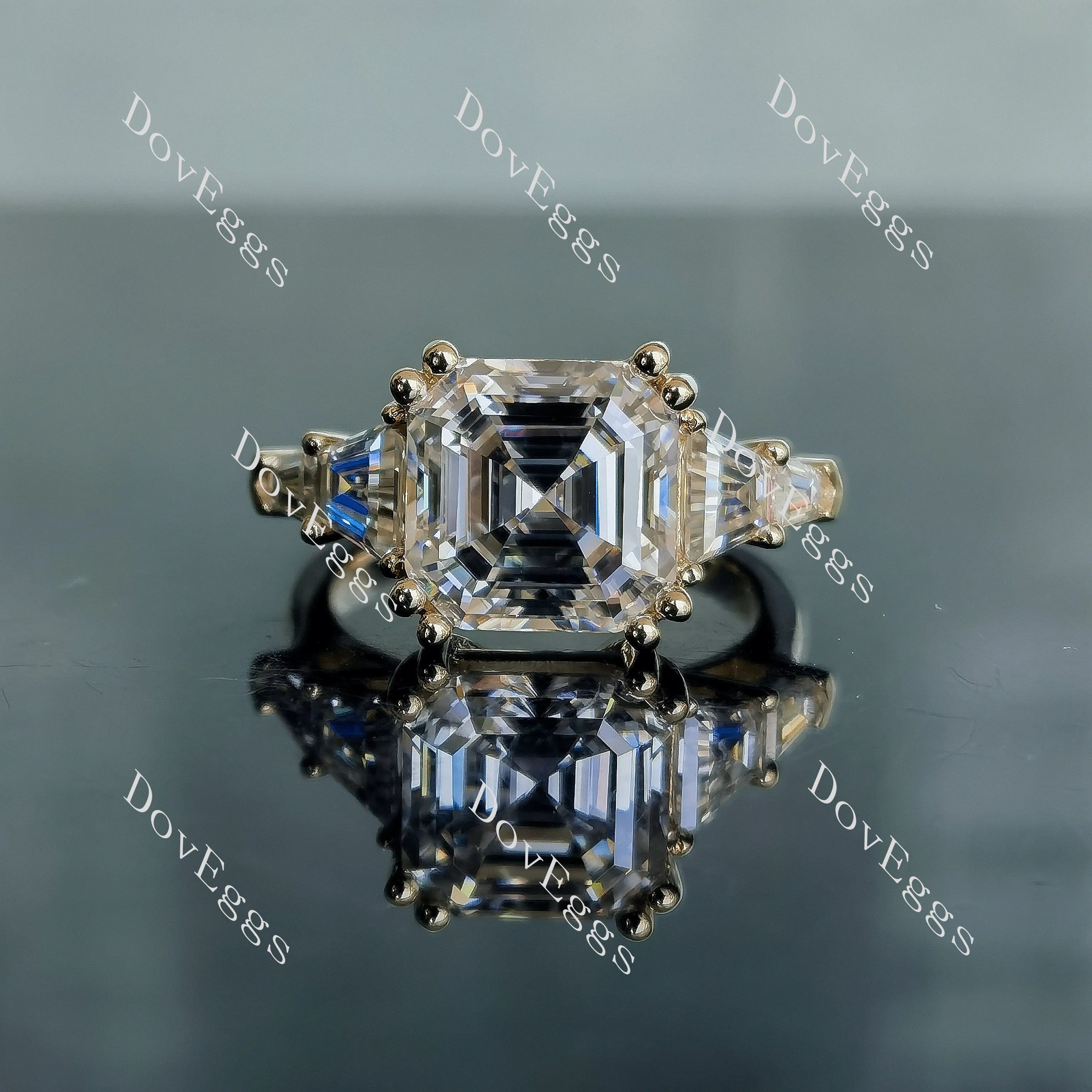 Doveggs three-stone side stones moissanite engagement ring