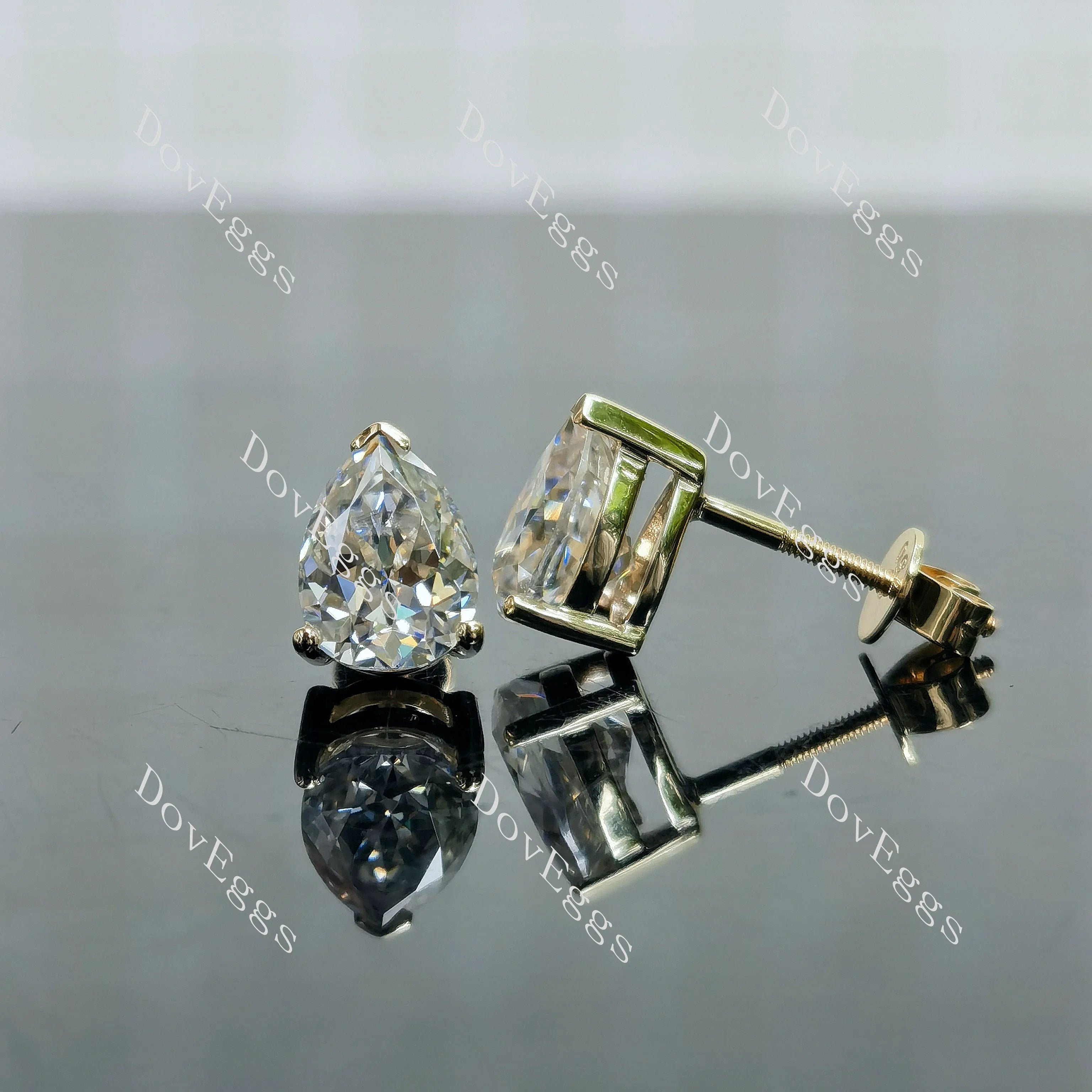 Doveggs pear pave moissanite earrings