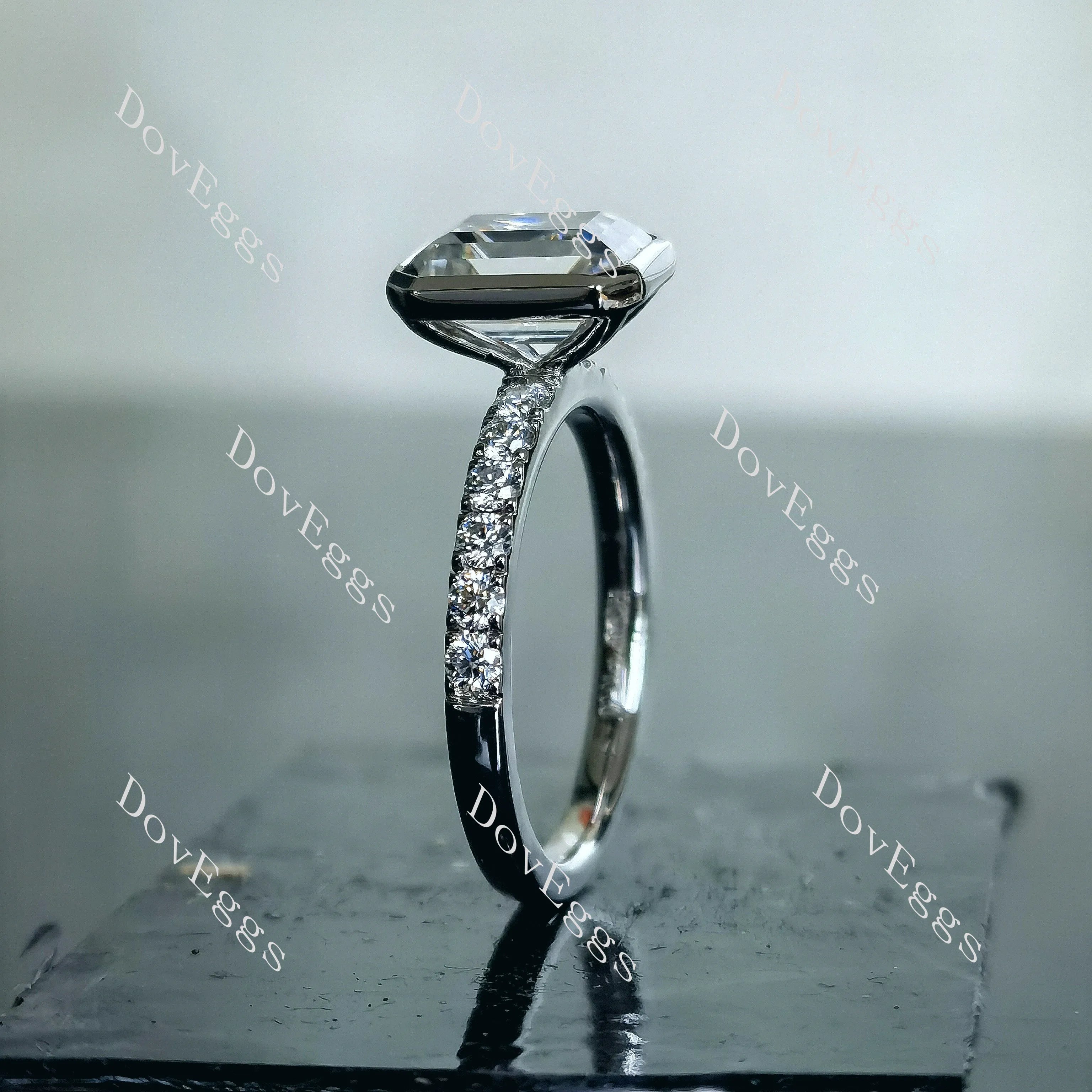 DovEggs emerald bezel half eternity pave moissanite engagement ring