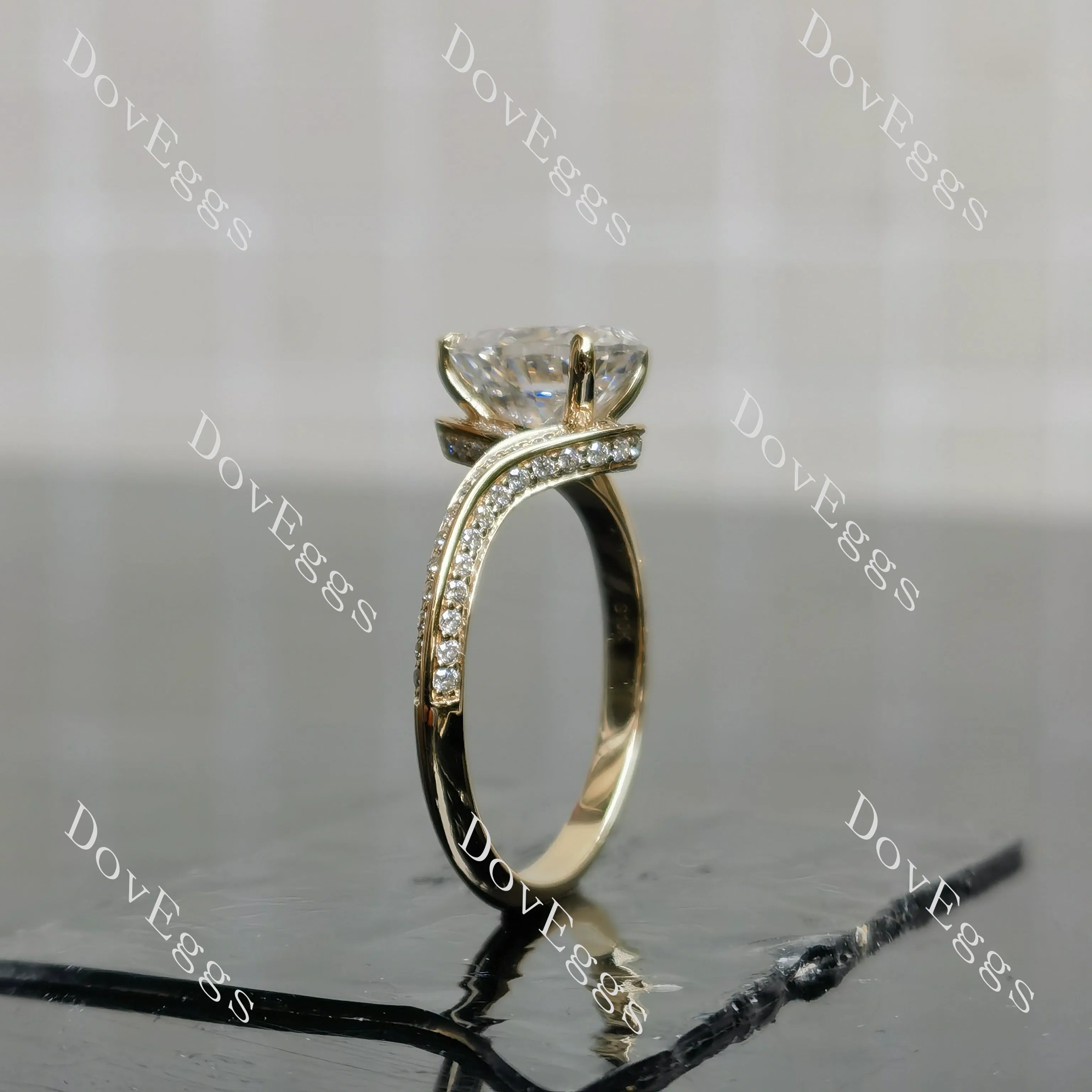 Stephanie’s Promise pear pave channel moissanite engagement ring