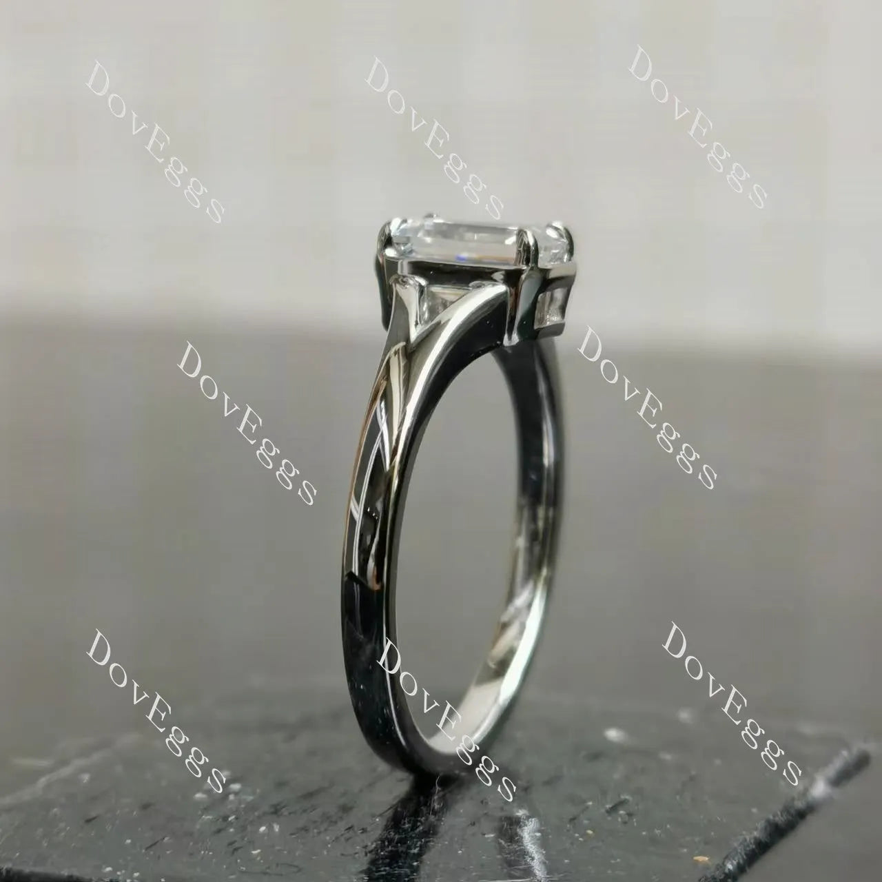 Emerald solitaire split shanks moissanite engagement ring| DovEggs