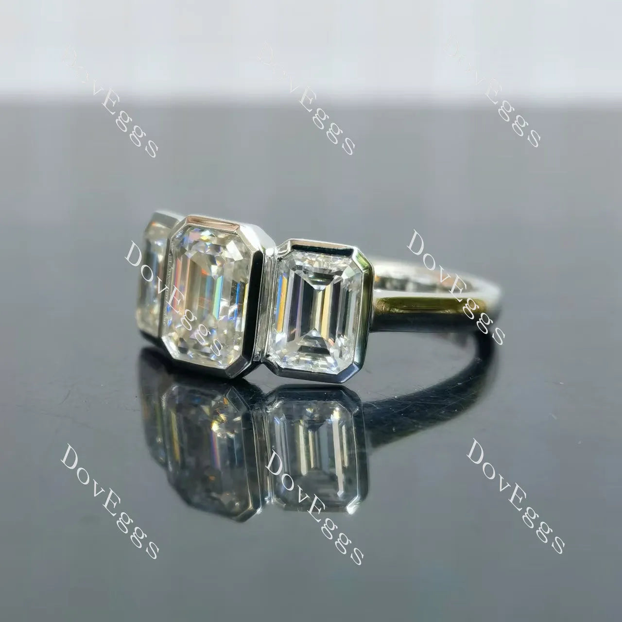 Emerald bezel three stones moissanite engagement ring| DovEggs
