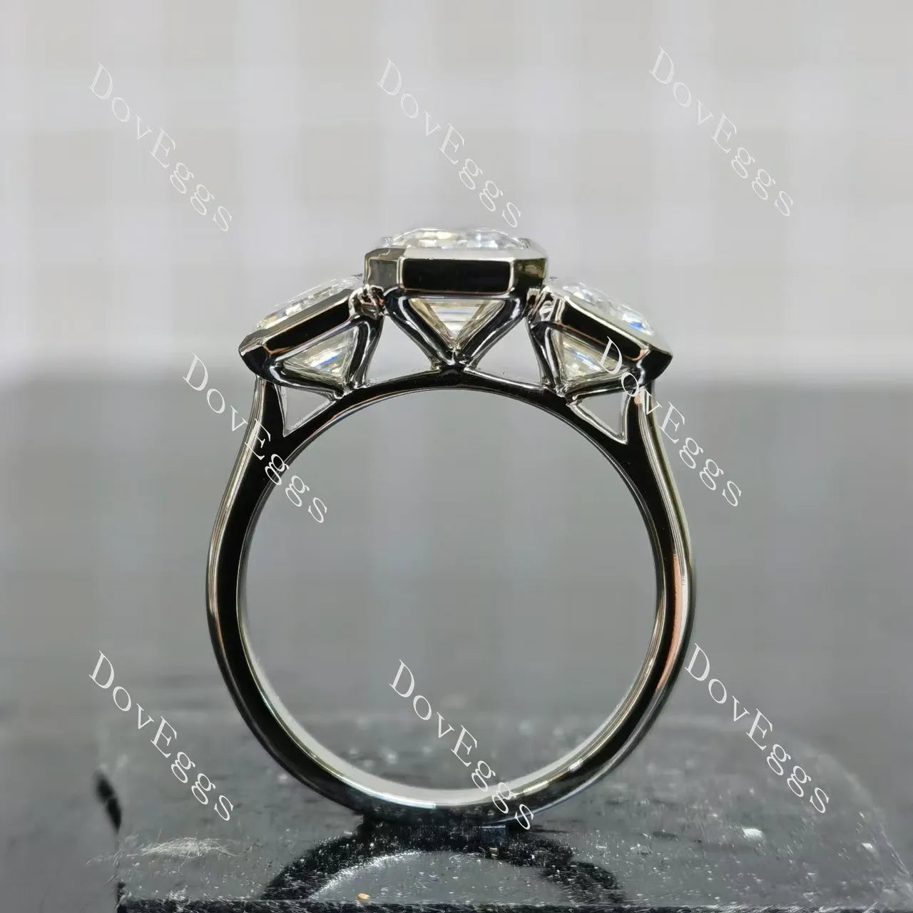 Emerald bezel three stones moissanite engagement ring| DovEggs