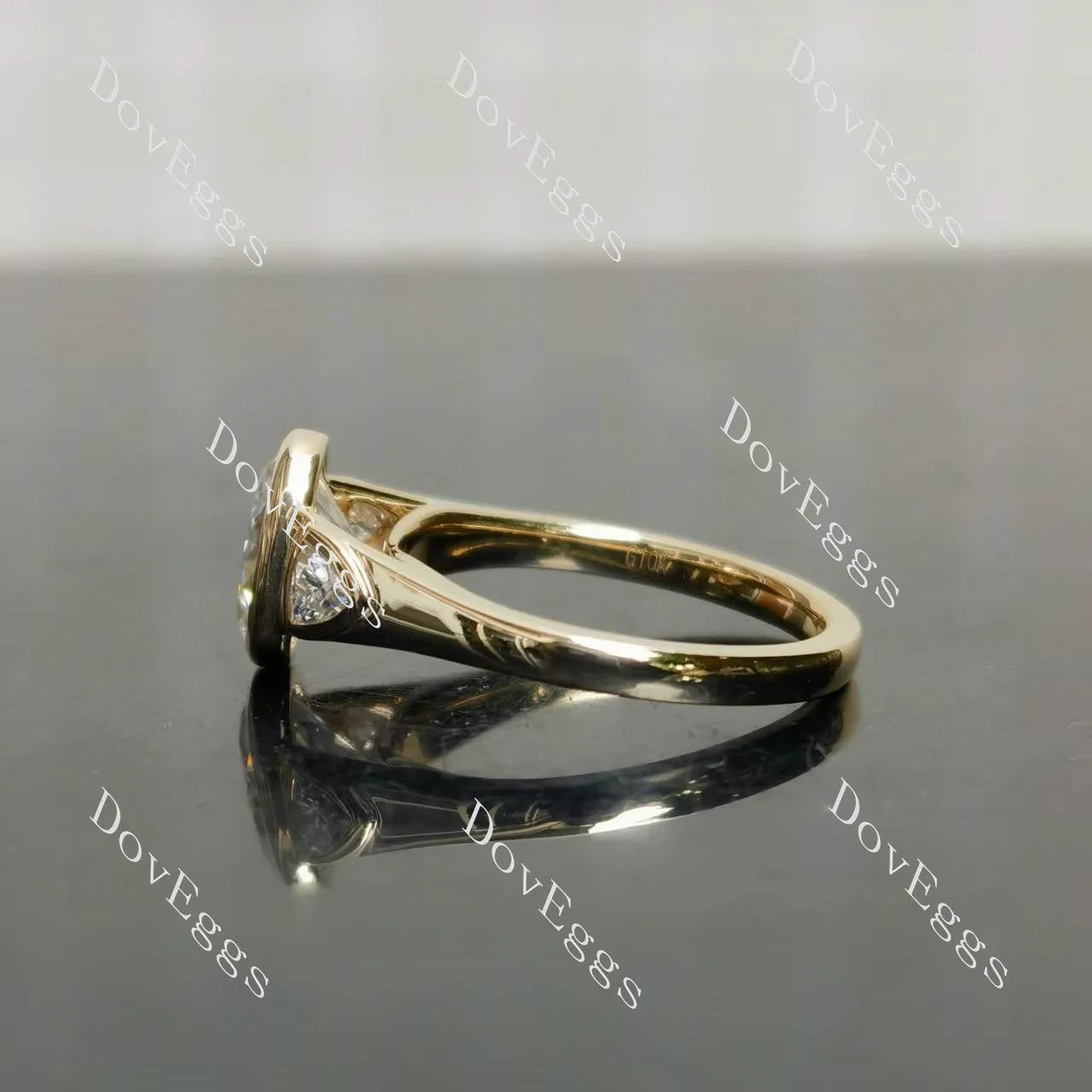Oval bezel three stones moissanite engagement ring| DovEggs