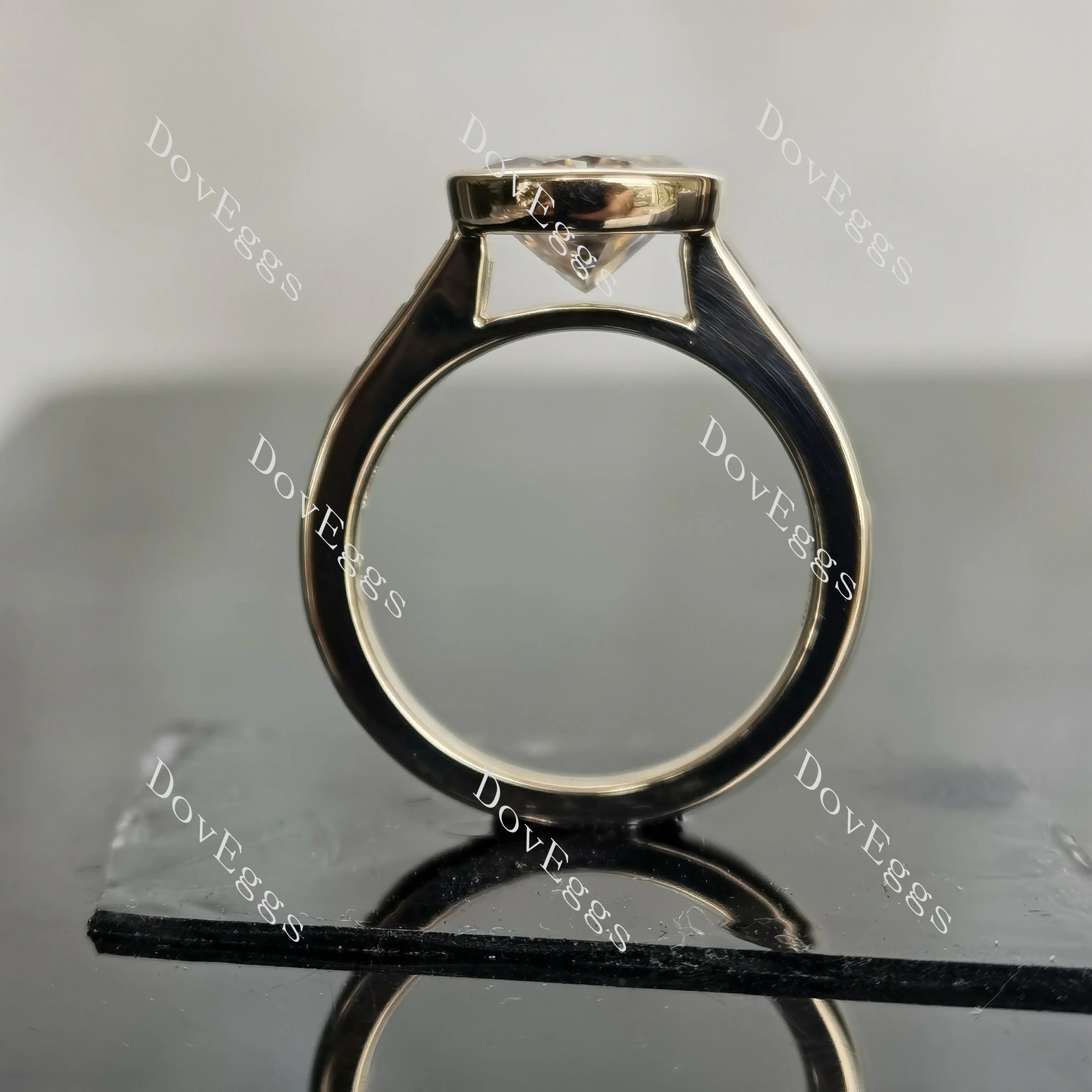 Oval bezel channel set moissanite engagement ring| DovEggs