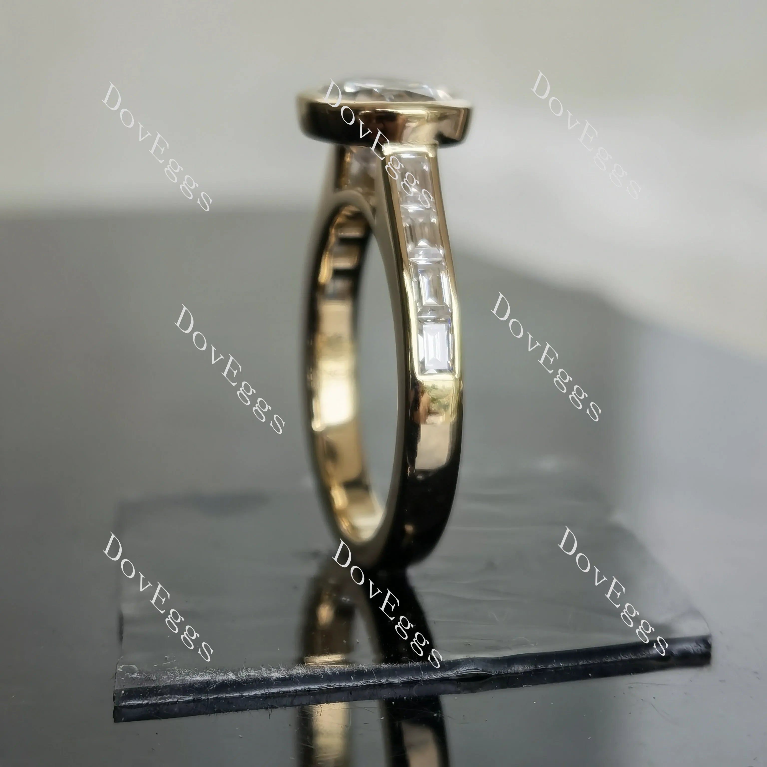 Oval bezel channel set moissanite engagement ring| DovEggs
