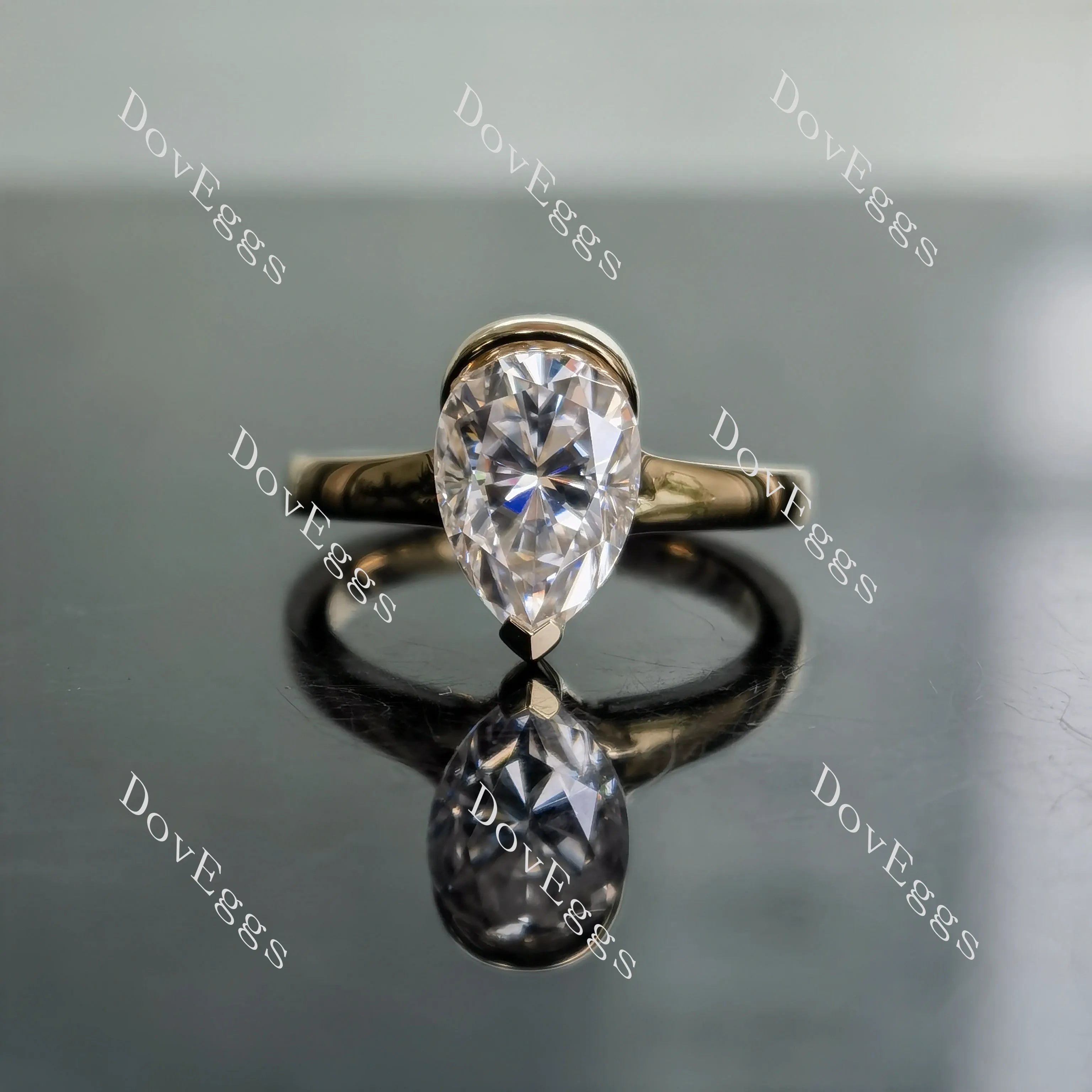 Kindal Dovie Doutch Marquise cut solitaire moissanite engagement ring