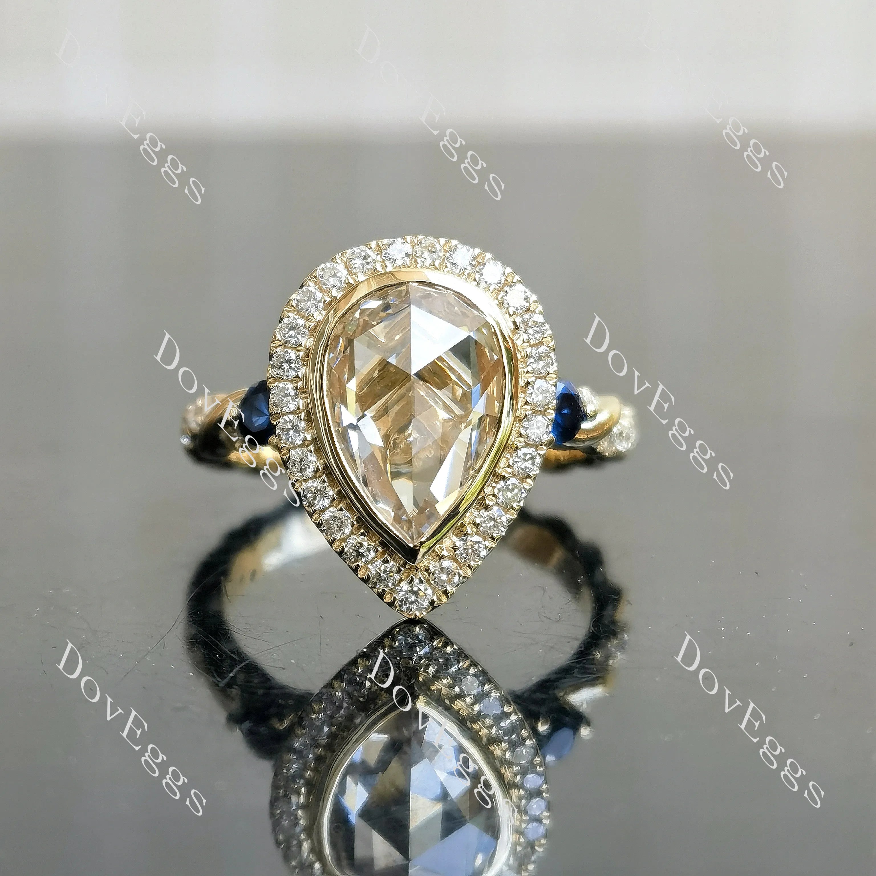 Pear bezel halo art deco moissanite engagement ring| DovEggs