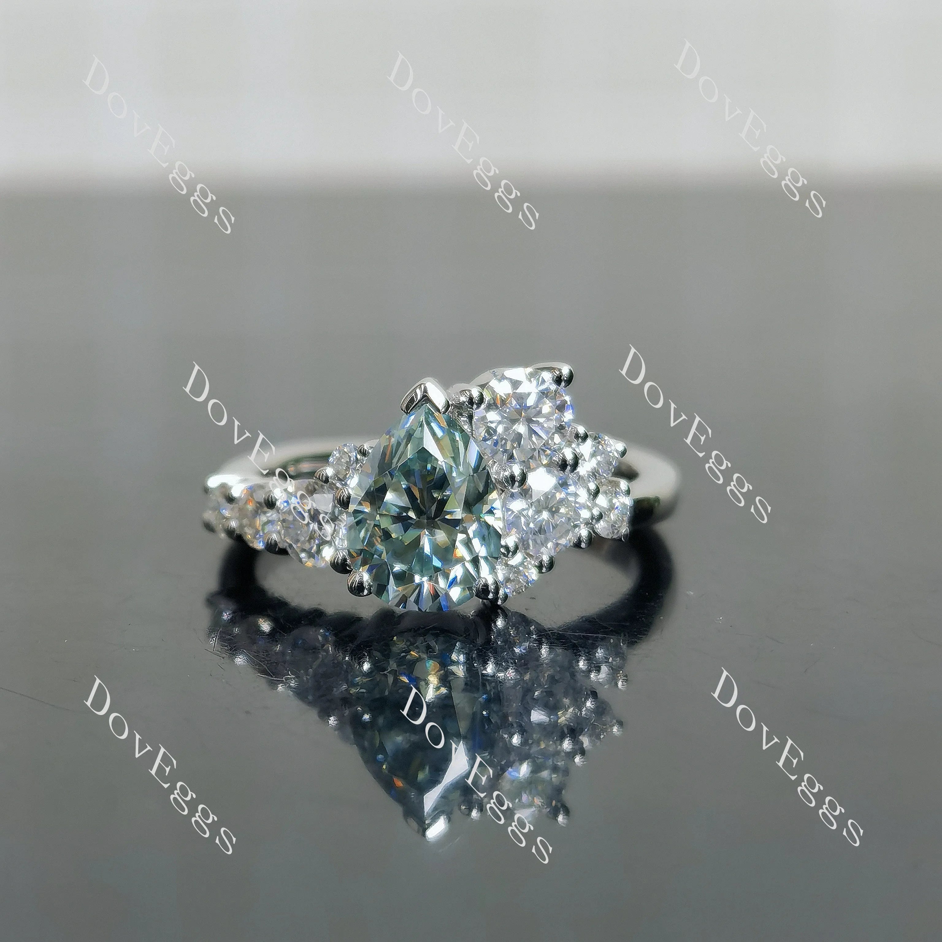Pear side stones colored moissanite engagement ring| DovEggs