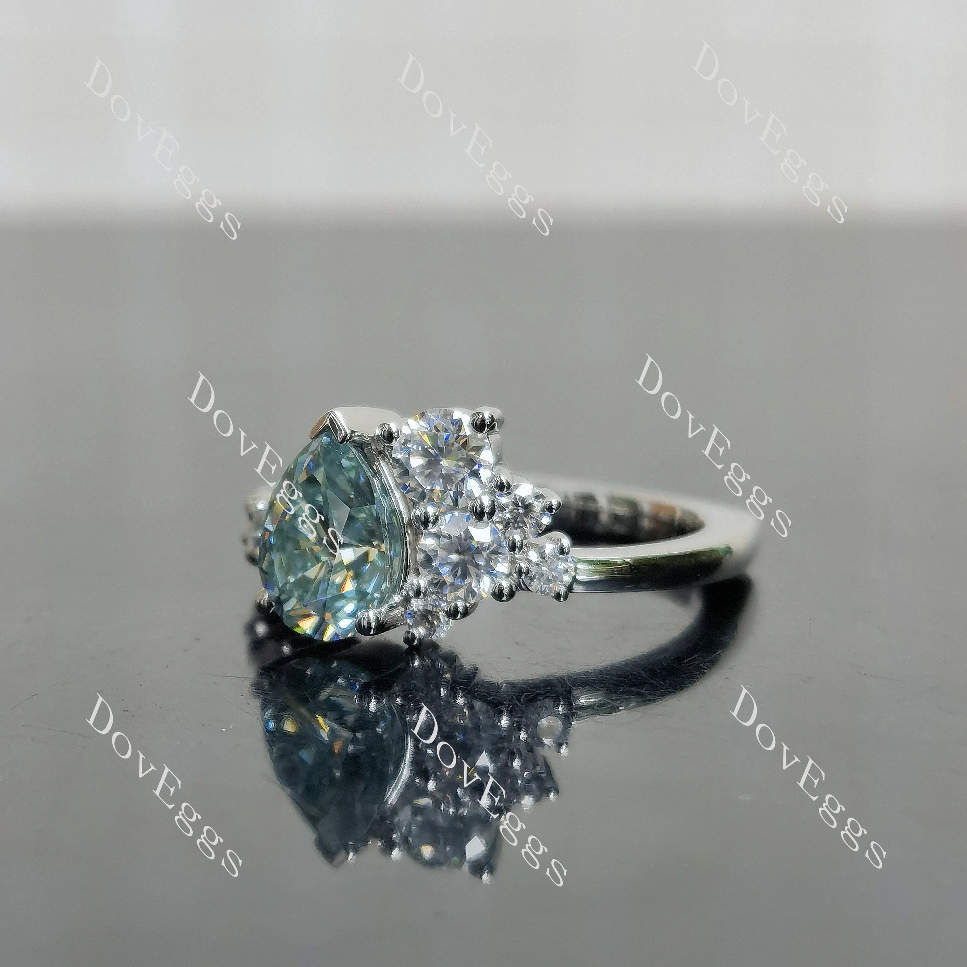 Pear side stones colored moissanite engagement ring| DovEggs
