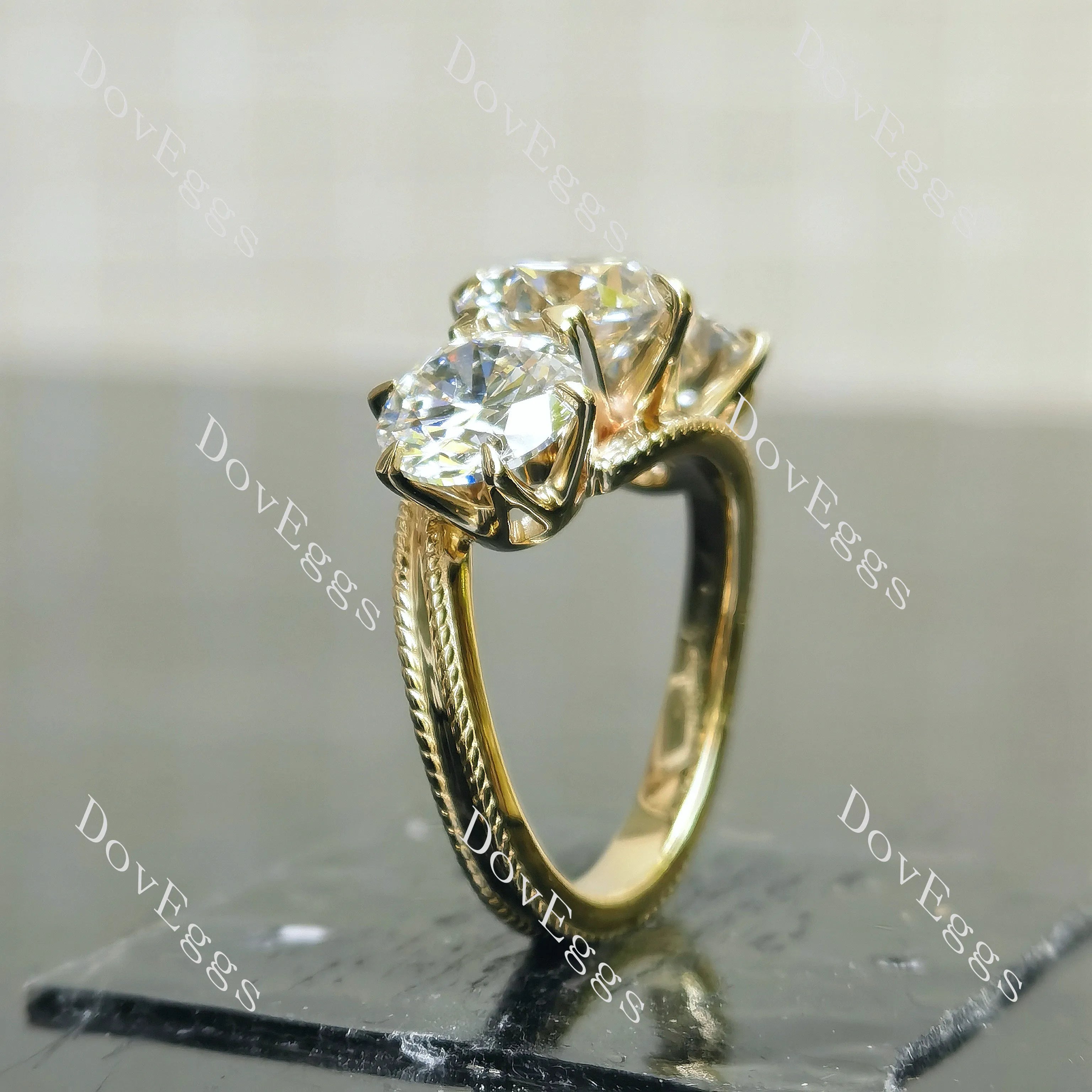 Tin’s Embrace-Round three stones moissanite engagement ring| DovEggs