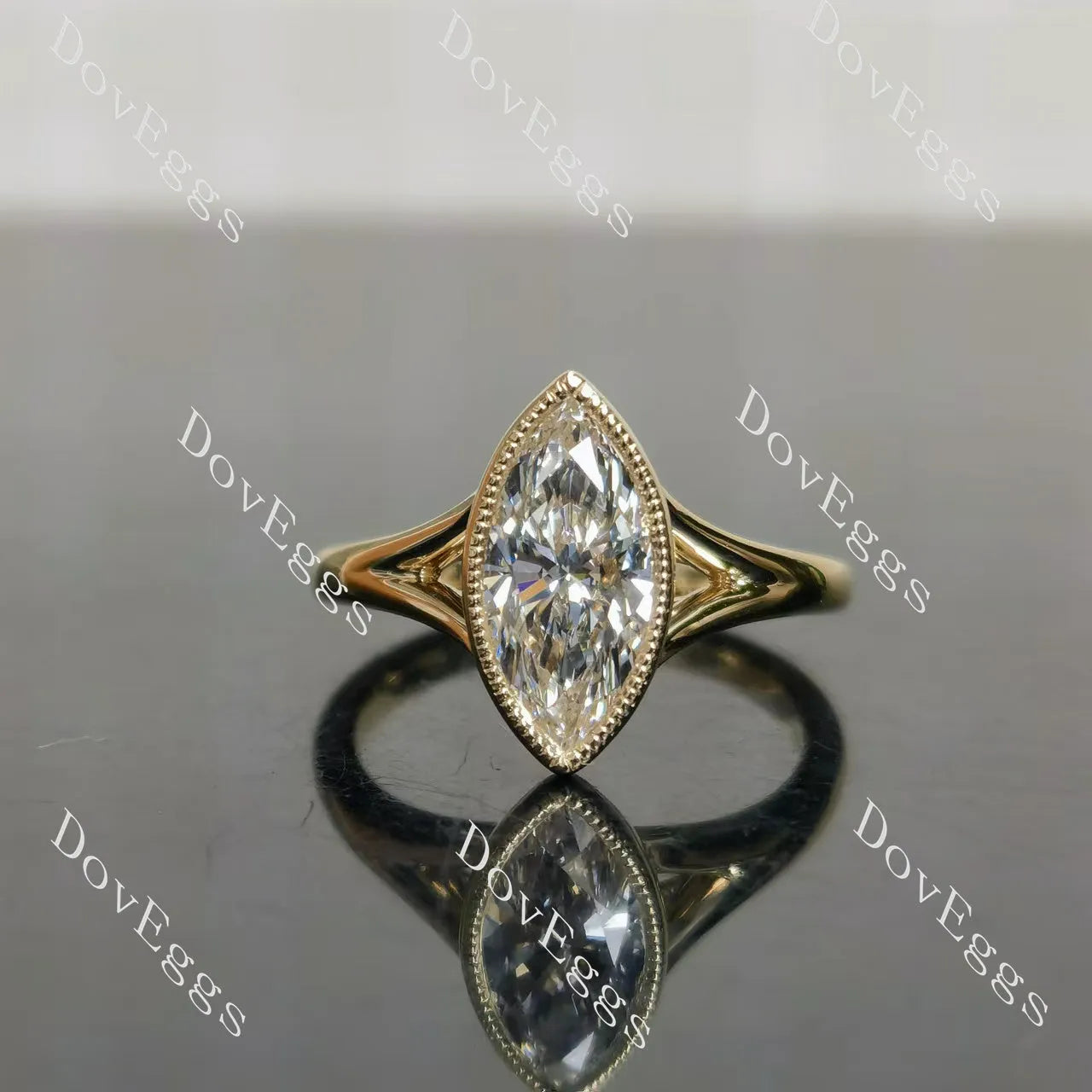 Marquise bezel solitaire split shanks moissanite engagement ring| DovEggs