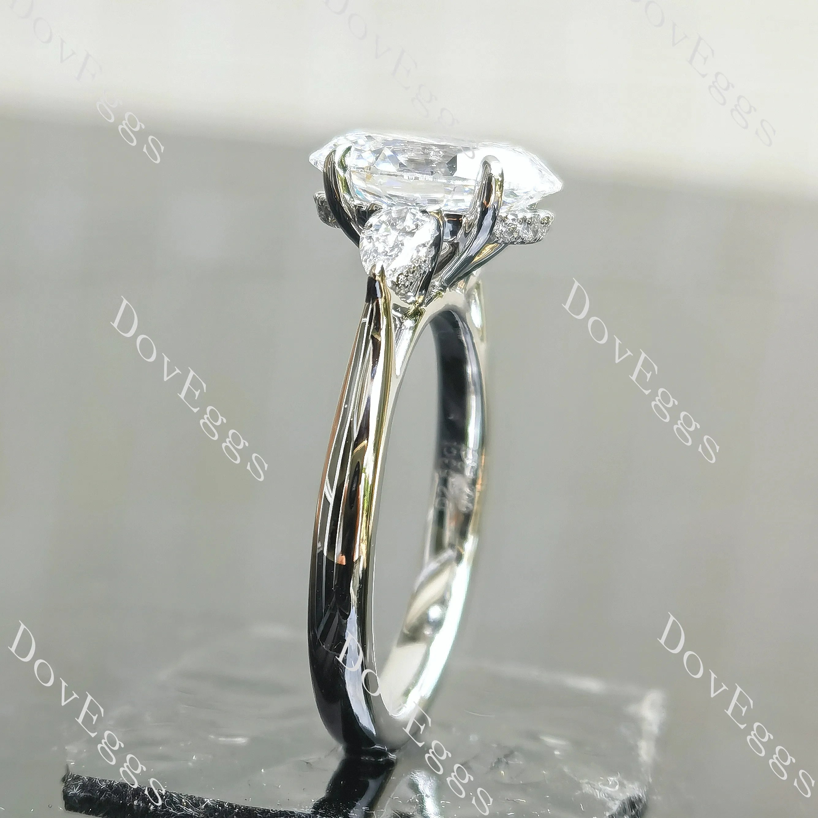 Oval side stones hidden halo moissanite engagement ring| DovEggs