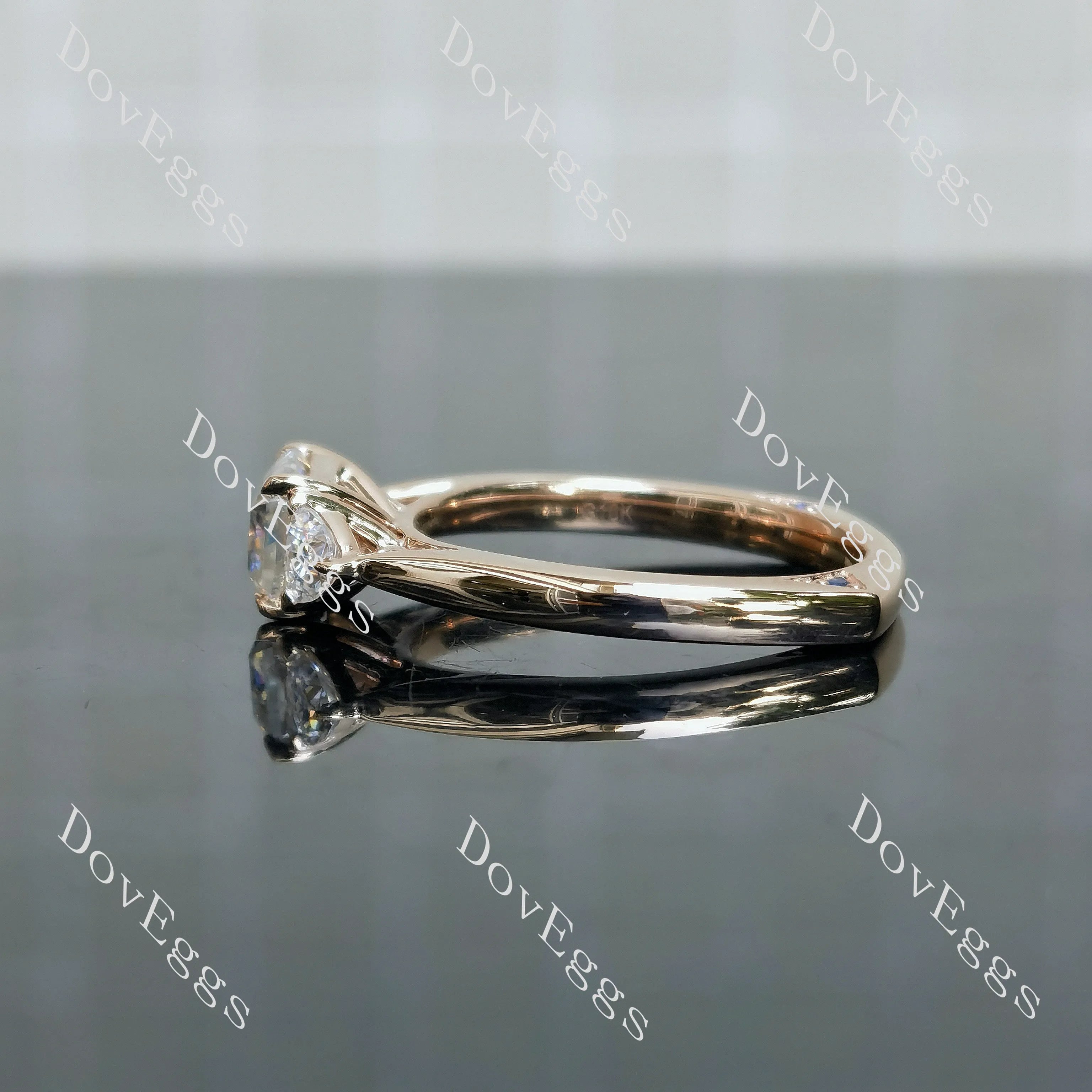 Doveggs emerald three-stones moissanite engagement ring