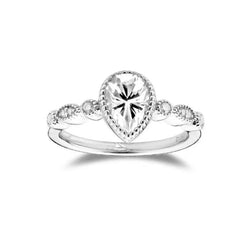 doveggs pear side stone moissanite engagement ring