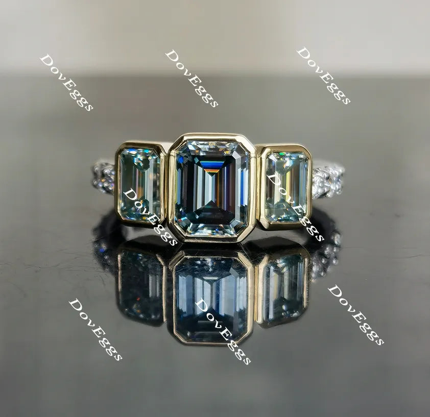DovEggs emerald bezel setting three-stone moissanite ring