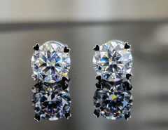 DovEggs solitaire round moissanite stud earring