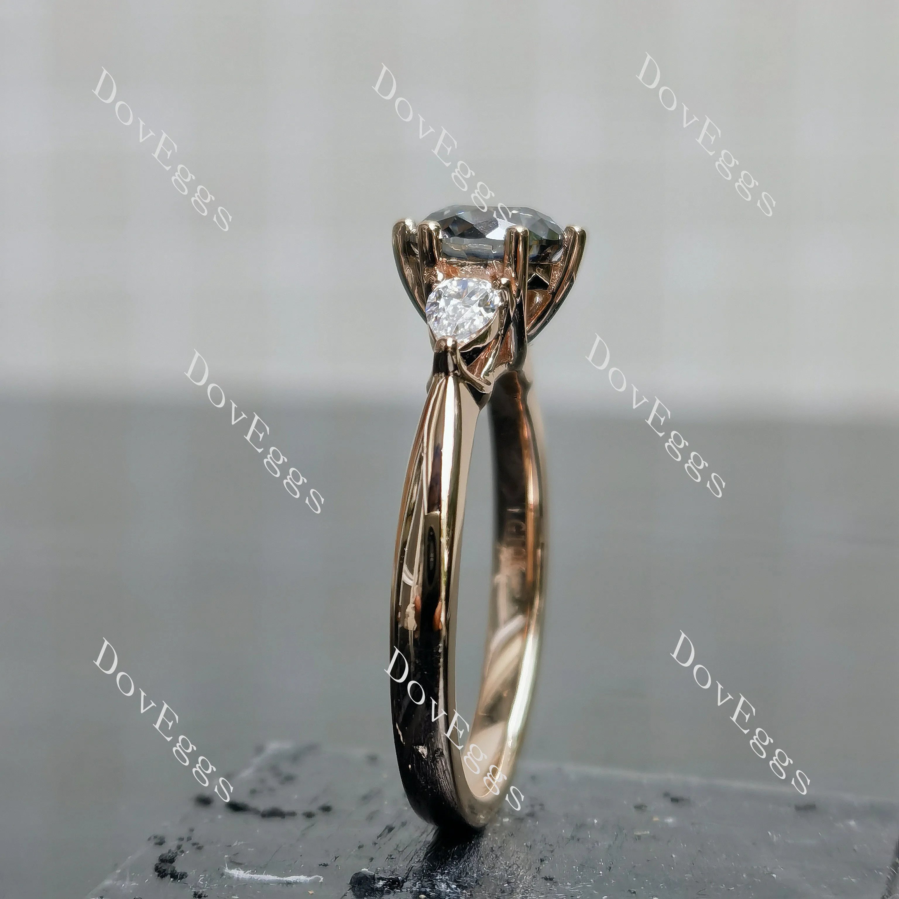 Doveggs round three-stone stardust grey moissanite engagement ring