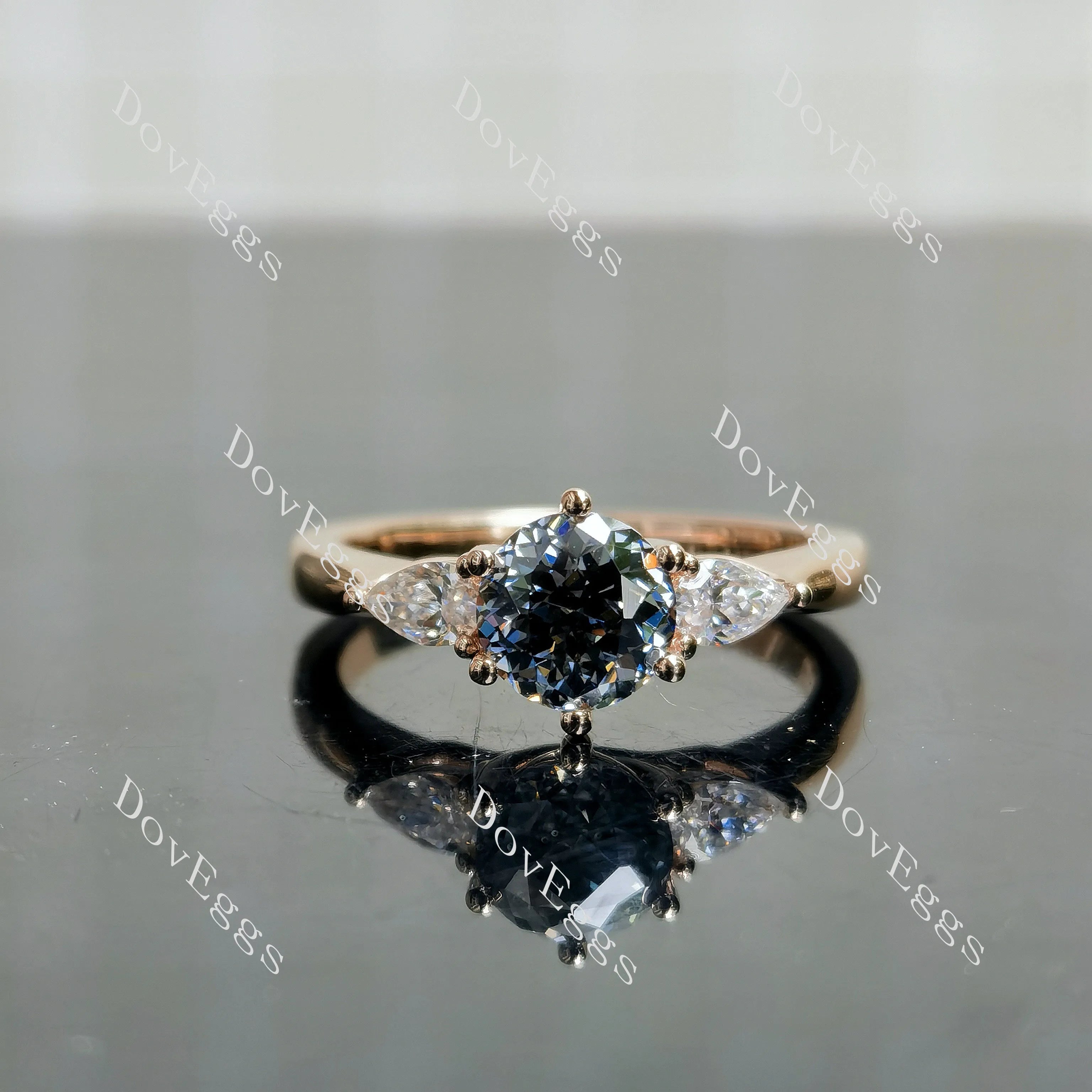 Doveggs round three-stone stardust grey moissanite engagement ring