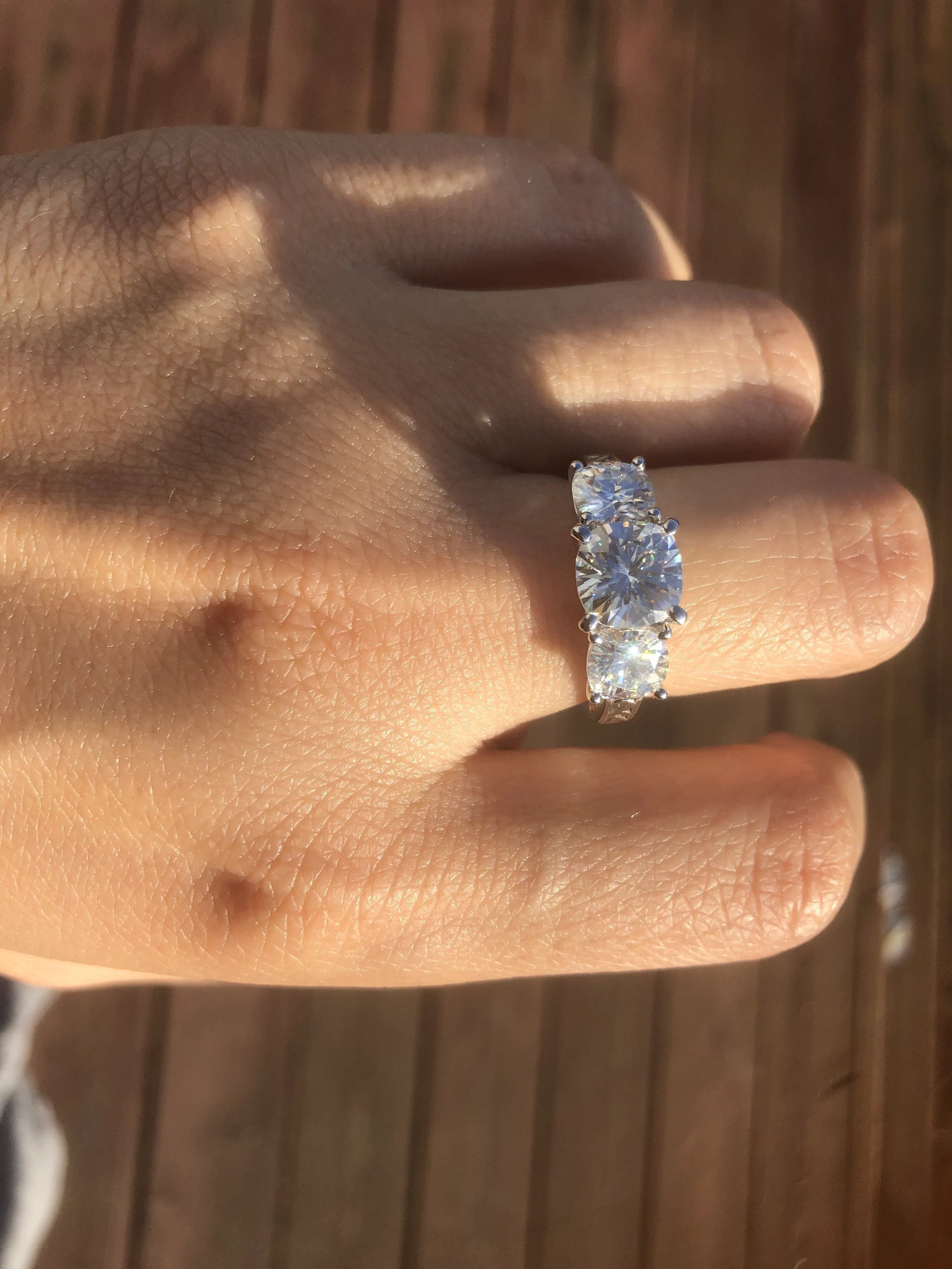 Doveggs cushion three-stone moissanite engagement ring