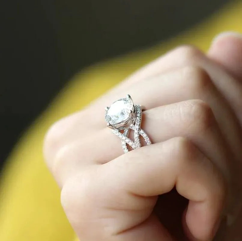 Doveggs round pave moissanite engagement ring with cris cross band