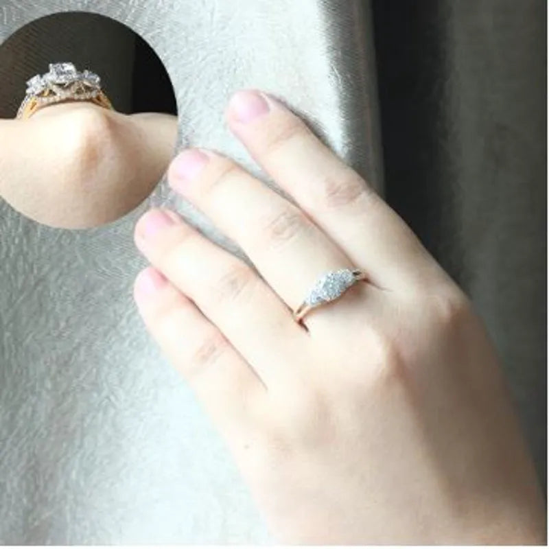 Doveggs round three-stone halo moissanite engagement ring