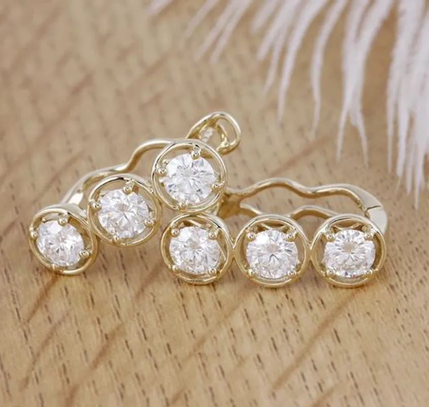 Doveggs three stone round moissanite hoop earrings