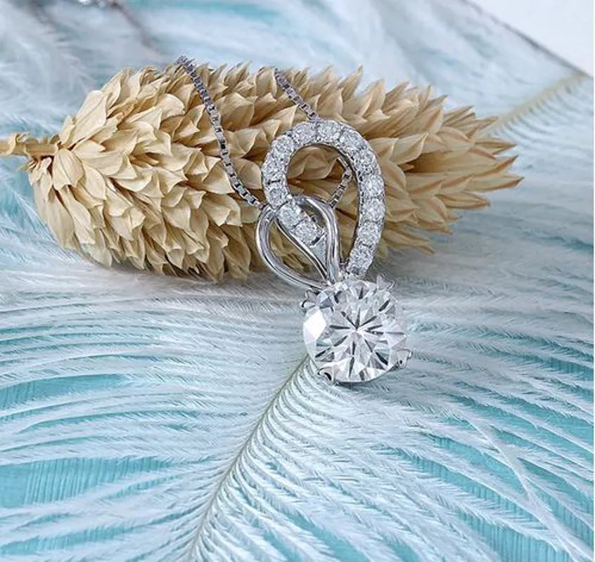 Doveggs round moissanite pendant necklace with accents (pendant only)