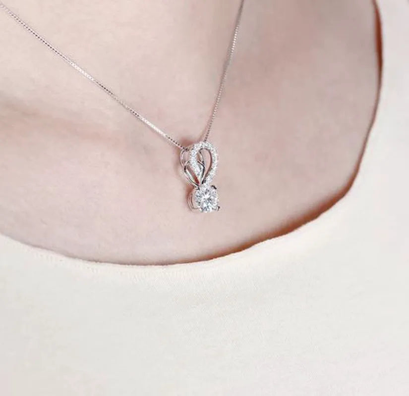 Doveggs round moissanite pendant necklace with accents (pendant only)