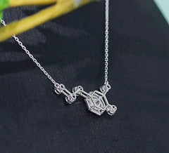 Doveggs round side stone moissanite pendant necklace