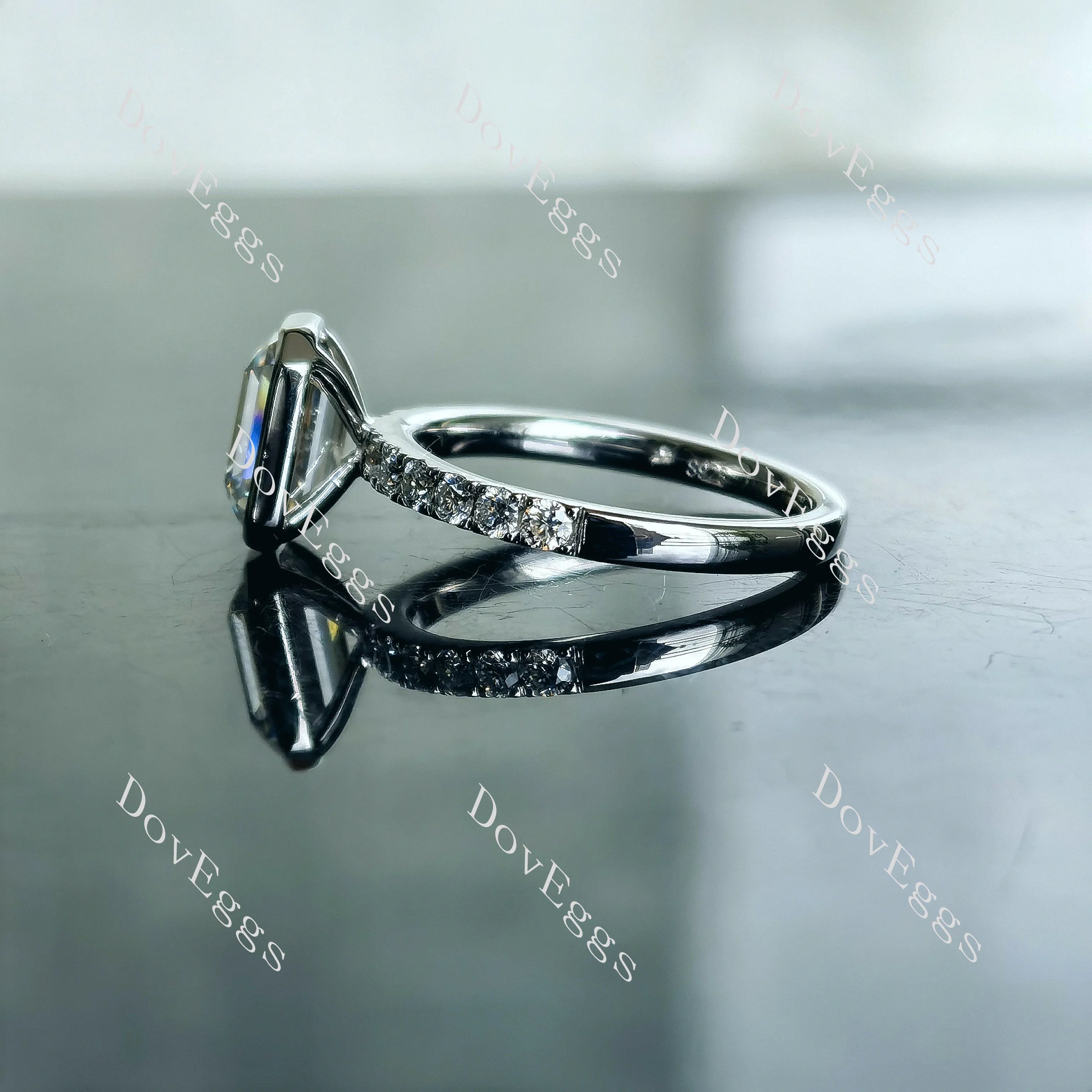 DovEggs emerald bezel half eternity pave moissanite engagement ring